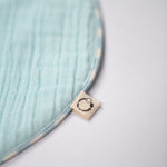Load image into Gallery viewer, Cloudberry Kiss Reversible Bib With Piping
